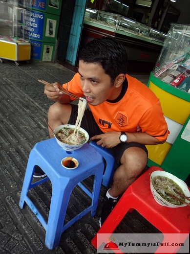 eating pho on the streets of vietnam